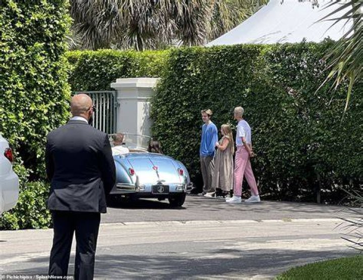 Trio: Romeo, 19, stood out from the crowd in unmissable pink trousers and a white top while Cruz, 17, sported an oversized blue sweater and Harper, 10, a trendy brown dress